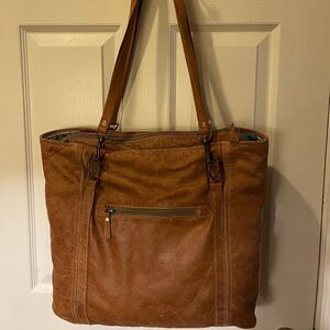 Heartstrings weathered leather tan extra large tote antique tone hardwares.